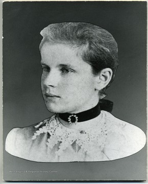 Age 16/17. Sallie Lowther Norris attended Glenville State Normal School before entering WVU. in 1889. Like her classmate and lifelong friend Harriet Lyon, she excelled in her studies, winning a freshman math prize. Norris spoke out frequently and eloquently on behalf of the right of women to a West Virginia University education and was a charter member of the Association of Collegiate Alumnae (now the AAUW) chapter in Fairmont. She raised four children of whom attended WVU, and provided essential assistance to her husband Judge Emmet Showalter, after illness left him partially disabled.