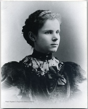 Sallie Lowther Norris attended Glenville State Normal School before entering WVU. in 1889. Like her classmate and lifelong friend Harriet Lyon, she excelled in her studies, winning a freshman math prize. Norris spoke out frequently and eloquently on behalf of the right of women to a WVU education and was a charter member of the Association of Collegiate Alumnae (now the AAUW) chapter in Fairmont. She raised four children of of whom attended WVU, and provided essential assistance to her husband Judge Emmet Showalter, after illness left him partially disabled.