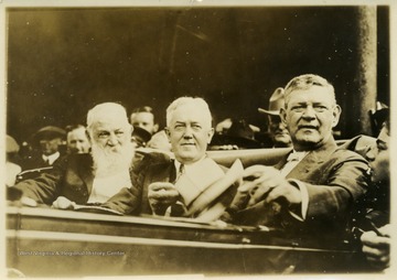 Davis (center) arriving in Clarksburg. Bearded man at left is John C. Johnson of Bridgeport.