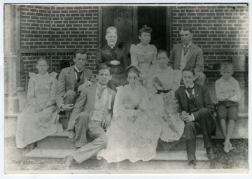 "From I. B. Dabney - Vicksburg, Miss." John W. Davis seated in front row at right.