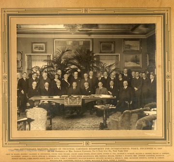 25th Anniversary Meeting, Board of Trustees, Carnegie Endowment For International Peace, December 14/ 1935. At the residence of Mrs. Andrew Carnegie, No. 2 East 91st St., New York City. Left to right, seated: Alanson B. Houghton, Count Paul Teleki, Count Carlo Sforza, Elihu Root, Austen G. Fox, Charles S. Hamlin, Roland S. Morris, Frank O. Lowden. Standing: George A. Finch, Edward L. Ryerson, Jr., Robert A. Taft, Peter Molyneaux, Mrs. Roswell Miller, Thomas J. Watson, Mrs. Andrew Carnegie, Nicholas Murray Butler, James Brown Scott, John W. Davis, James T. Shotwell, William Marshal Bullitt, Maurice S. Sherman, MME. Mathilde Perreux, Daniel K. Catlin, Wallace Mck. Alexander, Francis P. Gaines, Malcolm W. Davis, Henry S. Haskell.