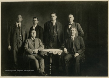Left to Right Standing: Dr. Elliot R., Joe D., Cap.  The others are just friends who did participate in the feud.