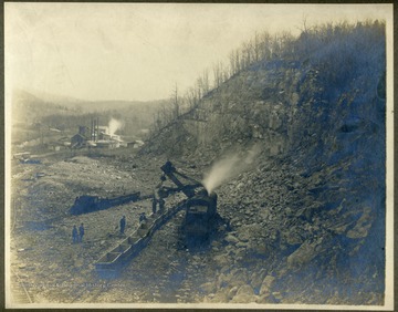 Information on the back of the photograph includes, " This picture is 1918 when he worked at a rock crusher for Albert Riggs, near Alderson, WV, Uncle Charles Thomas".