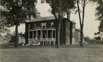 Built by Dr. Grigger and torn down in 1928. The property was used to build a high school. For more information refer to the back of the photograph.