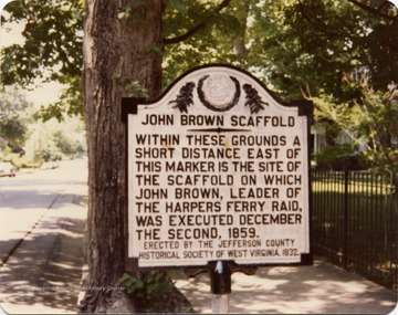 Color print of a marker which indicates the area on the Gibson-Packette-Todd property, where John Brown was executed. 