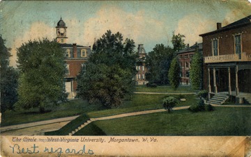 Post card illustration of the buildings on Woodburn Circle on the West Virginia University campus including: Martin Hall (with clock in the cupola), Woodburn Hall and Chitwood Hall, and Experiment Station in the foreground.