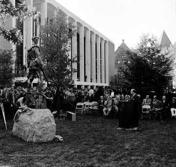 West Virginia University President James Harlow speaks at the unveiling ceremony for the Mountaineer Statue, on campus, outside the Mountainlair.