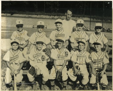 Group portrait of team. Only three players identified: back row , first left, Selby; front row, third from left , Denison, fourth, Werswick.