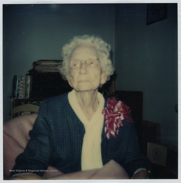 Photograph taken on her 100th birthday. Blanche Stonestreet taught school in several West Virginia counties including Tyler, Harrison, Upshur, and Monongalia for 48 years. Her last teaching position was in the Mathematics Department at West Virginia University. 