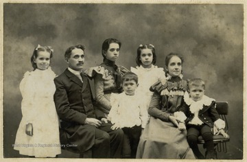 Left to right: Vera, Rev. Frank Rector, son of Enoch Rector, Beulah, Randolph, Miriam, Martha Pickering Rector, and Gordon