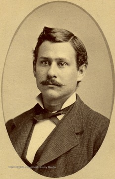 Portrait of a young man wearing mid-19th century attire.