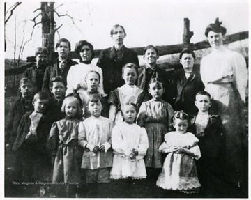 First Row: Rober Sine, Hazeltine Sine, Wilbur Rice, Ella Marris, ? Tennant (sister of Jasper). Second Row: Kent Sine, Harry Husk, Goldie Brock, Mary Sine, Delilah Sine, Jasper Tennant. Third Row: Jae Hinenbaugh, Ira Brock, Eva Rice, Marion Brock, Charles Wood, Bert Tennant. Teacher- Effie Wade.