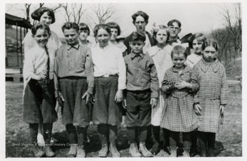 Front Row Right to Left: Mae Brock, Laura Tennant, James Tennant, Ralph Gray, Daniel Tennant, Clayton Gray. Second Row: Clara Lemley, Margaret Lemley, Donnis Gray, Artie Lemley, Bessie Lemley (teacher.) Third Row: Ray Lemley, Cecyle Gray.