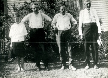 Left to Right: Bernard Ashcraft, Harry G. Ashcraft, William H. Ashcraft, and Francis M. Ashcraft. Francis M. Ashcraft is the great-grandfather of Bernard, grandfather of Harry and the father of William.