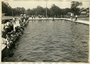 Each morning campers took a swim in this pool before breakfast.  The pool was completed in summer 1925.