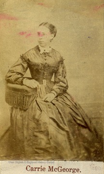 Mid 19th century portrait of a member of the McGeorge family. The year of the photograph may have been during the Civil War era. The dress and hair style are of that period.