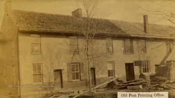 The Morgantown Post newspaper office was torn down in 1891 to make room for the new court house. The newspaper was started by Henry Morgan in 1864 and the office was occupied by Morgan and his partner, N. N. Hoffman for 27 years.