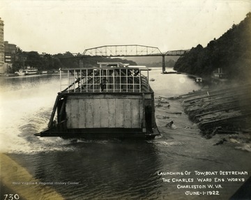 Launch of towboat, Destrehan on the Kanawha River. Built by The Charles Ward Engineering Works in Charleston, West Virginia.
