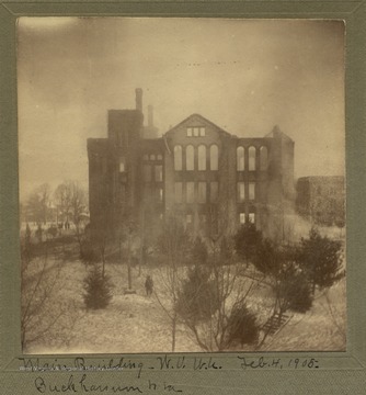 Only the outside walls of the main building of the West Virginia Conference Seminary (later West Virginia Wesleyan College) remain after a fire.