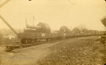 Charles Ward Steam Generators being transported by train on a railroad spur from the plant in Charleston, West Virginia.