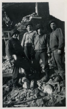 This photograph was included in West Virginia University student, Louis Piccola's narrative, documenting his military experiences in World War II. The soldiers were not identified , however they are probably in Piccola's outfit, the 17th Cavalry Reconnaissance Squadron, 83rd Infantry.