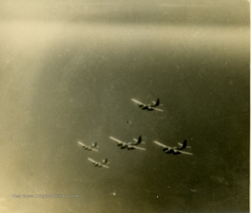 A-26 Invader Attack Bombers flying in a tight formation somewhere in the Pacific Theater during World War II.