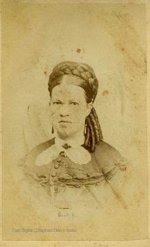 A carte de visite portrait of of a woman, probably a member of the Young or Perkins family of Charleston, West Virginia.