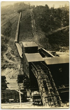 Photograph postcard of the tracks and tipple of Mine # 2.