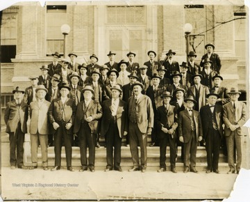 Photograph taken at Hinton High School. Identified L to R, Back Row: G. H. Harwood, Joe Hayth, Cecil Lively, N. S. Seldomridge, , --Patton, E. M. Bobbit, Isaac Meadows, --Eubanks, Brown Nunley;  Second Row: F. S. Hunter, --Poteet, Tom Youell, Wood Wickline, Clarence Seldomridge, Tom Rogers, Bert Ashley, George Nutting, Ira Wiseman; Third Row: Dick Cobb, E. K. Rogers, Lindsay Burks, M. M. Mastin, Bob Jones, Howard Honaker, Elmer Garten, Deifenbach, W. G. Dameron, C. H. Fredeking; Fourth Row: Bob Noel, Charlie Poore, Henry Ailstock, Lynn Gardner, Richard Thomasson, --Eubanks, --Cottle, --Hout, Tuney Swatts, C. I. Smith, C. S. Faulconer.