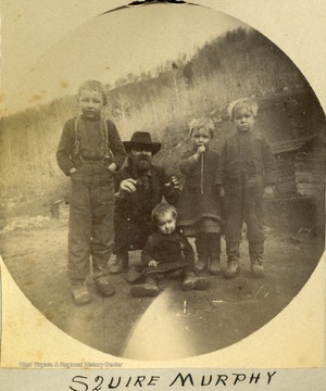 Squire Murphy, 2nd from the left and four unidentified children.
