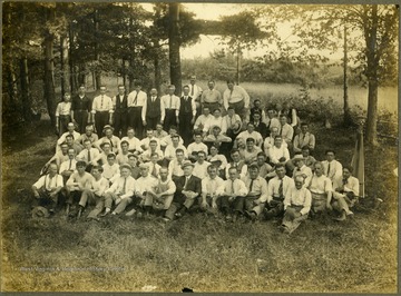Photograph of an unidentified male community song group. Probably taken at the Green Sulphur Annual Fair in Summers County. Two men in sleeveless shirts are pictured in another group photograph (id # 039235). This photo was purchased by Stephen Trail in Hinton, West Virginia. 