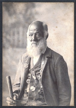 Shields was the body servant of Colonel James Kerr Edmondson, Company H, 27th Virginia Infantry, "Stonewall Brigade" during the Civil War. Shields, shown here wearing several medals awarded to him by Confederate Veterans Groups, claimed to have also cooked for General Thomas "Stonewall " Jackson.