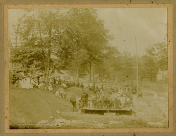 Photograph of the corner stone laying of a Presbyterian church. All persons in the photograph are unidentified. The church was located in Wise County, Virginia. 