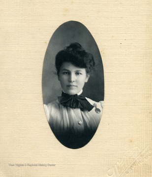 Daughter of John Z. and Harriet P. Ellison. Portrait taken while Clara was a student at WVU.