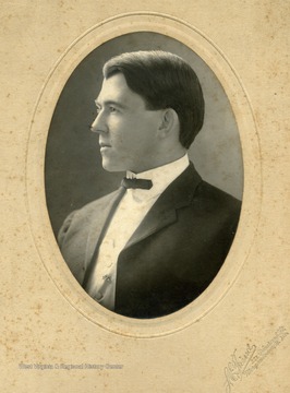 Inscribed on the back of the photo is "L.A. Burns, a school man"