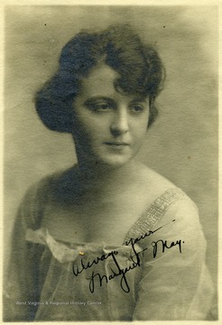 Inscribed on the photograph is "Always yours, Margaret May".