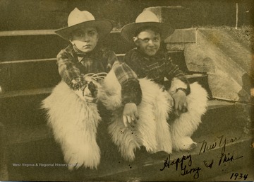 Inscribed on photograph, "Happy New Year, George and Mike".