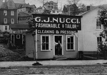 Information included with image,"G. J. Nucci. Remembered by many as Frank's Barber Shop. On Elk St. where Gassaway Diner was for many years."