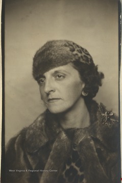 Portrait of Margaret Barrick, the daughter of Max and Anna Mathers, attached to the inside of a Christmas card. Margaret Barrick raised her two sons with the help of her parents, while a student at West Virginia University in the early 1930's. During one semester, she was the only student enrolled in an experimental pathology course at the School of Medicine (listed as the smallest class at WVU).