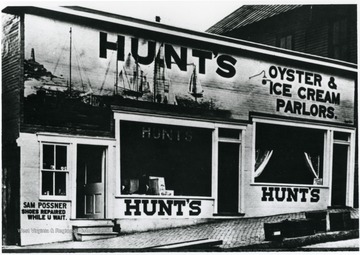 John Hunt was an African American businessman who operated several resorts, hotels and eateries in Morgantown. He opened Hunt's Oyster Parlor for Ladies at 127 Walnut Street. He was best known for his ice cream factory located on the corner of Hough Street and Beechurst Avenue. It was the first ice cream plant in Monongalia County. Information on p. 40,101, in "Our Monongalia" by Connie Park Rice. Information with the photograph includes "Reproduced from the John H. Hunt family photos, held by WVU Women's Centenary Project, Center for Women's Study Archive. Original Loaned by Virginia Hunt Chandler." 