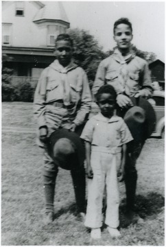 Two older boys are probably wearing boy scout uniforms. Information on p. 150 in "Our Monongalia" by Connie Park Rice. Information with the photograph includes "Courtesy of Robert Jackson". 