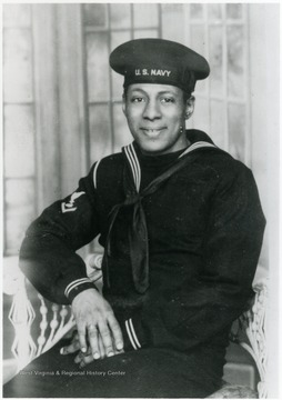 Eugene Holland in his U. S. Navy uniform. Information on p. 143 in "Our Monongalia" by Connie Park Rice. Information with the photograph includes "Courtesy of Ivry Moore Williams".