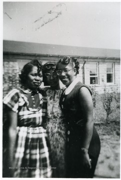 L to R: Ruth Barnett, Lennie Wiley,and Annette Chandler Broome. In 1957, Annette Broome was the first known African American woman to receive an undergraduate degree from West Virginia University. She was the granddaughter of John Hunt. Information on p. 161 in "Our Monongalia" by Connie Park Rice. Information with the photograph includes "Courtesy of Charlene Marshall".