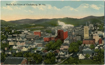 This is a colored postcard photograph of Clarksburg, West Virginia. See back of the original image for correspondence. 
