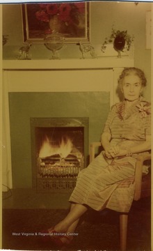 Information with the photograph includes: "Ada H. Ford at home New Year's Eve, Dec. 31, 1952, wearing the orchid given her by Layne H. Ford [her son] for Christmas, Pruntytown Road, Grafton, W. Va.". 