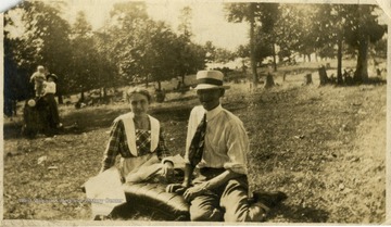 Information included with the photograph, "For Guy, His 'Country Cousins'" The people in the background of the photo are unidentified.