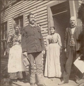 Far left is Maggie Musgrave and far right her husband, Eli Musgrave. The other two people are unidentified. 