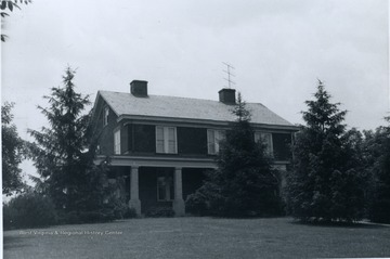 Located at 885 Riverview Drive, it was originally owned by O. H. Dille and was built in 1850. Information found on page 36 in "The influences of Nineteenth Century Architectural Styles on Morgantown Homes" by Clyda Paire Petitte. It is Figure 19.