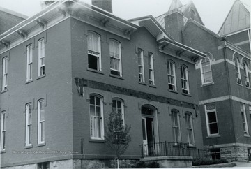 Located next to the court house on Chancery Row and built in the Italianate style in 1881. Information found on page 81 in "The Influences of Nineteenth Century Architectural Styles on Morgantown Homes" by Clyda Paire Petitte. It is Figure 57.