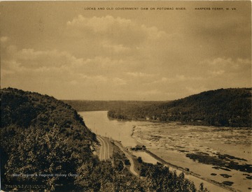 Described as a "Sepia Albertype Card", includes an elevated view of the Baltimore &amp; Ohio Railroad tracks and the C &amp; O Canal.